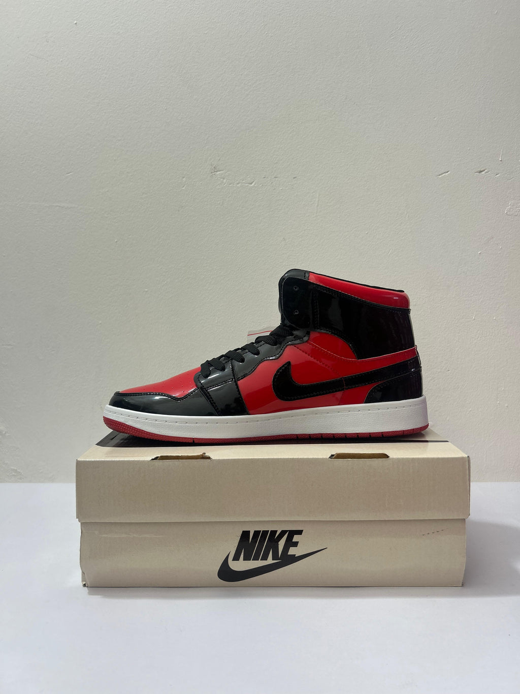 Air Jordan 1 Mid – Bred Patent Leather Edition